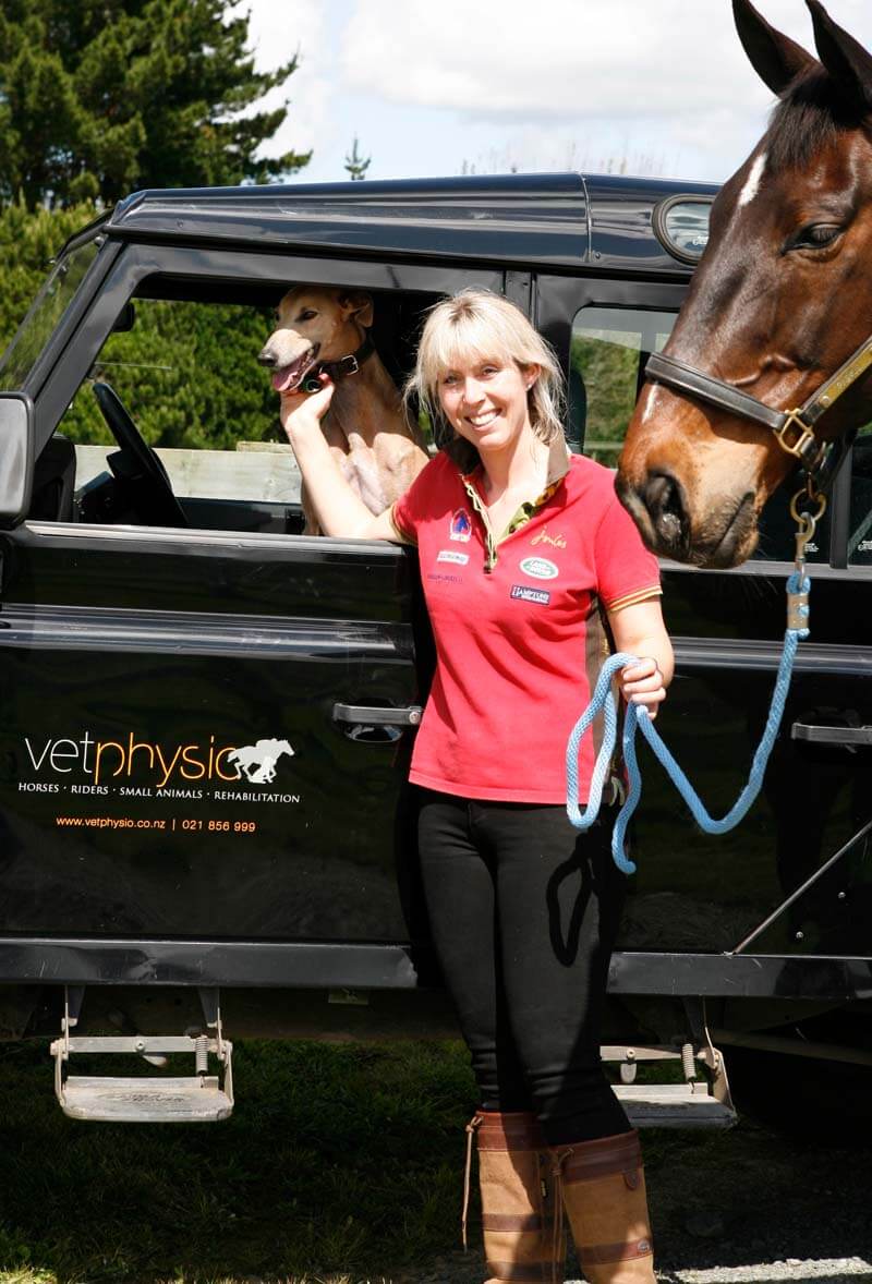 Sarah Vet Physio founder with horse & dog